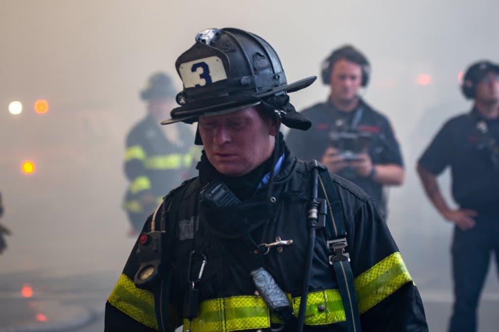 A firefighter on scene with his crew